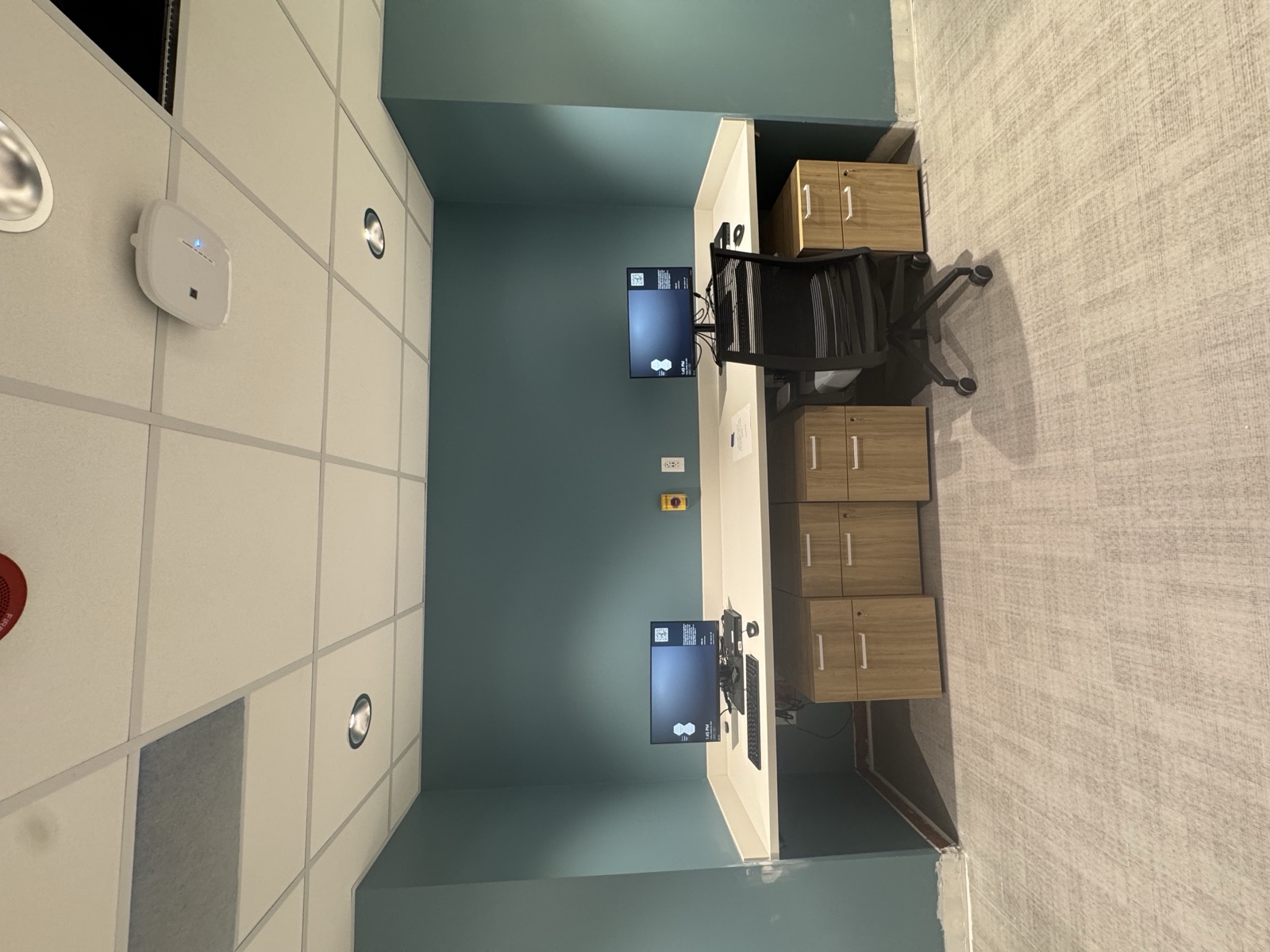 Healthcare charting station with a solid surface counter by Argent Concepts