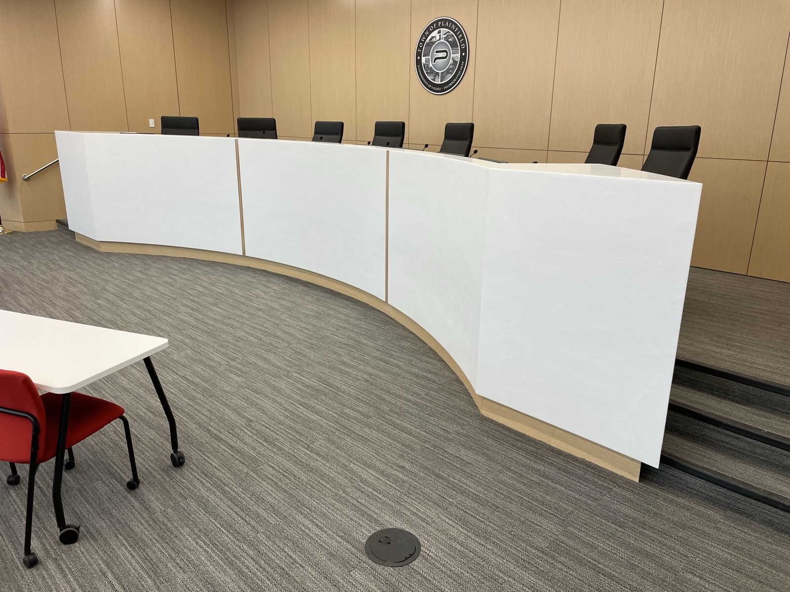 A curved solid surface council dais fabricated by Argent Concepts